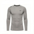 Camiseta Manga Larga Deportiva Gris Para Hombre Ref. CAMBU01